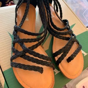 Carlos Santana sandals